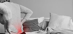 صورة: الأعراض العامة لالتهاب فقرات أسفل الظهر